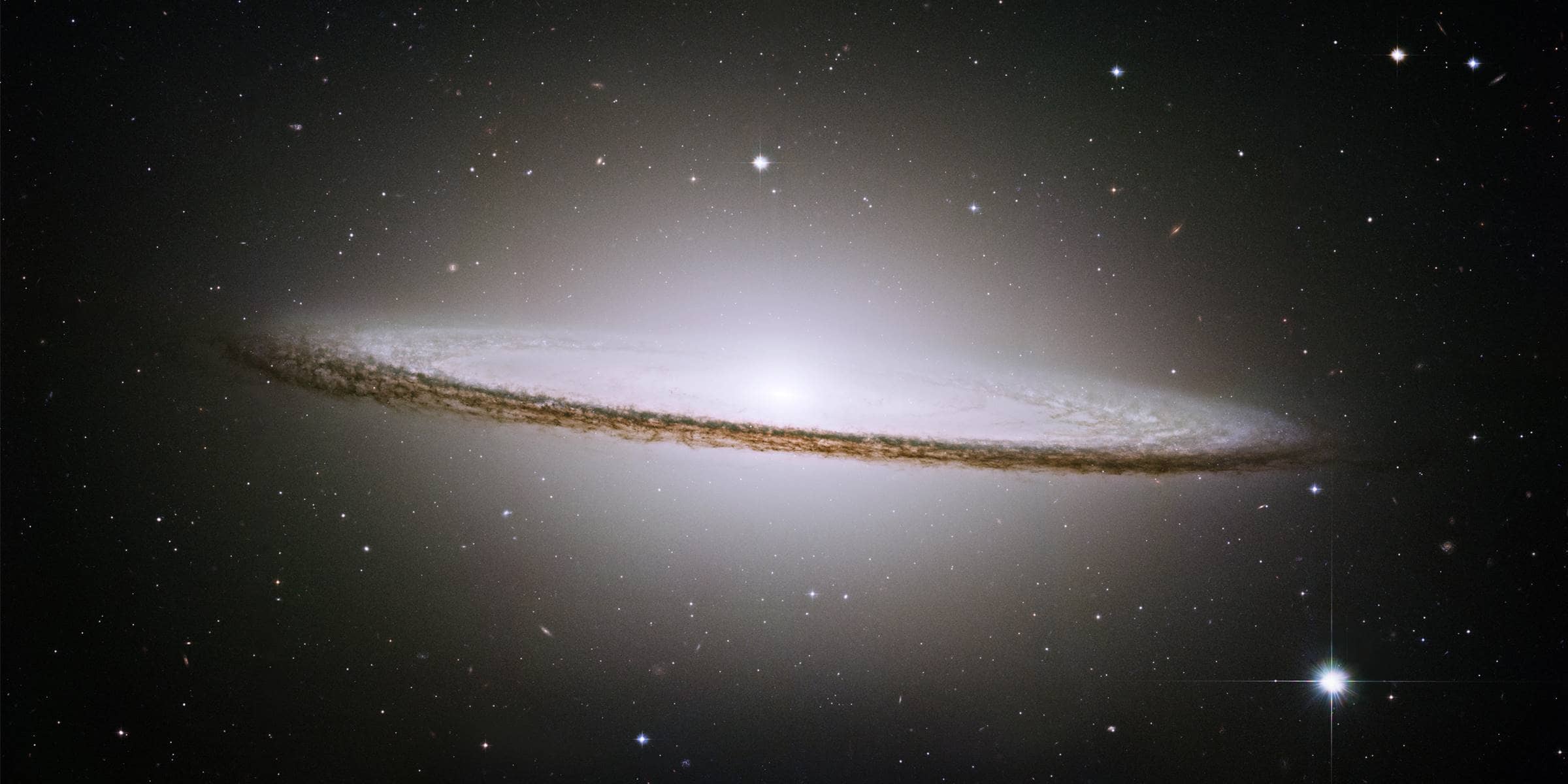 The Sombrero Galaxy is a spiral galaxy in the constellation borders of Virgo and Corvus, being about 9.55 megaparsecs from our galaxy, within the local supercluster